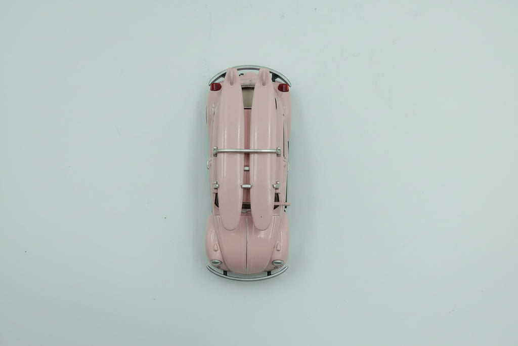 Norev 1/64 Volkswagen Beetle (1973) with Surfboard - Pink