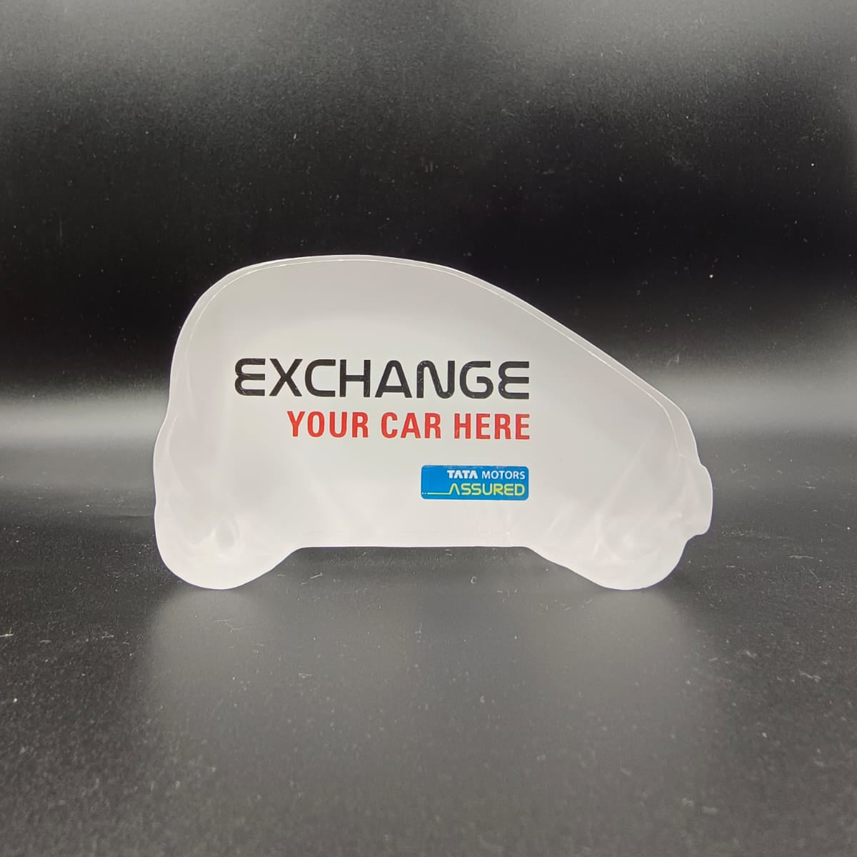 Tata Motors Assured Acrylic Car-Shaped Tabletop Exchange Stand
