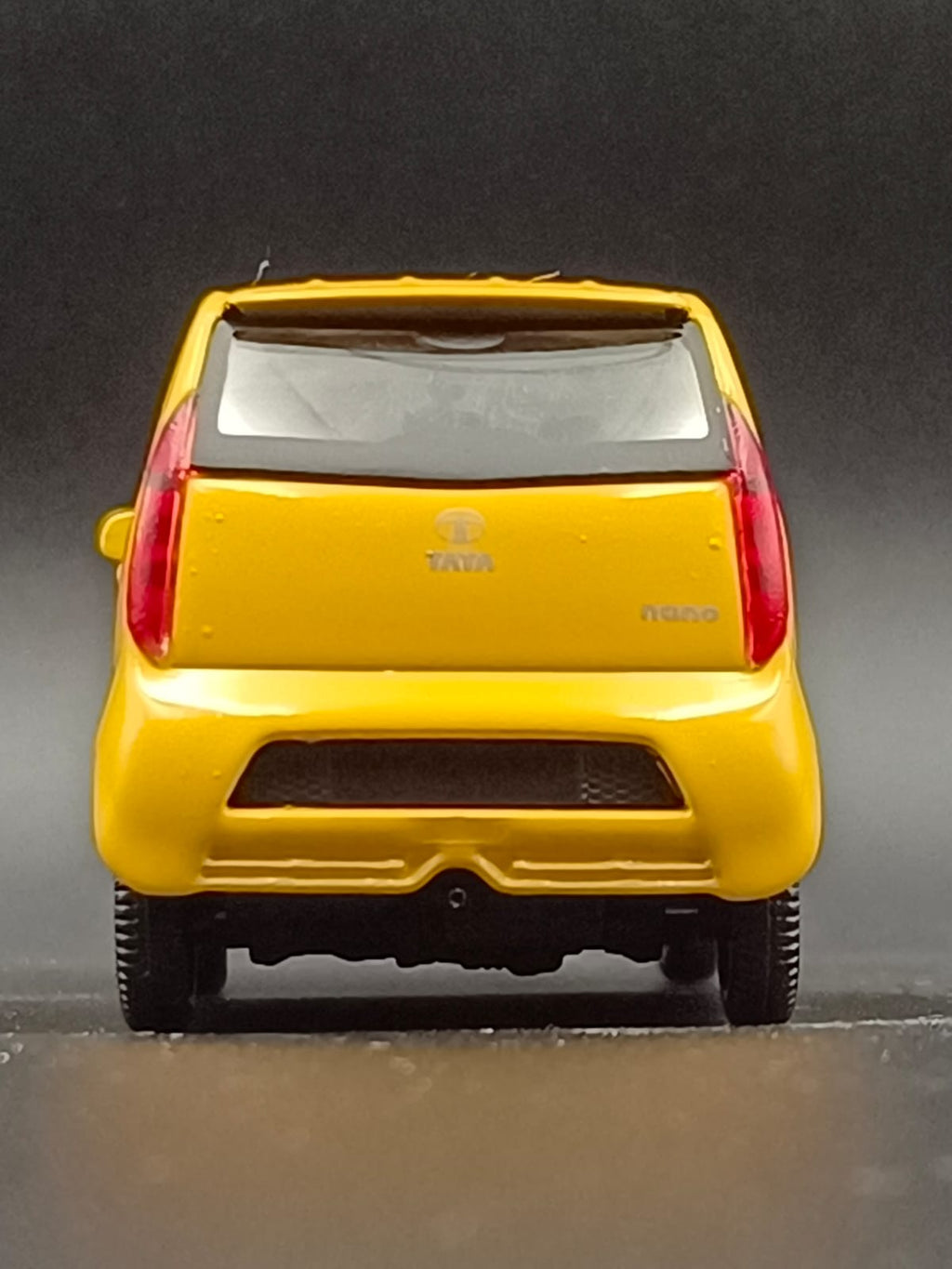 Tata Nano Miniature Scale Model Toy Car (Yellow) - Pull Back/Free Wheel Action