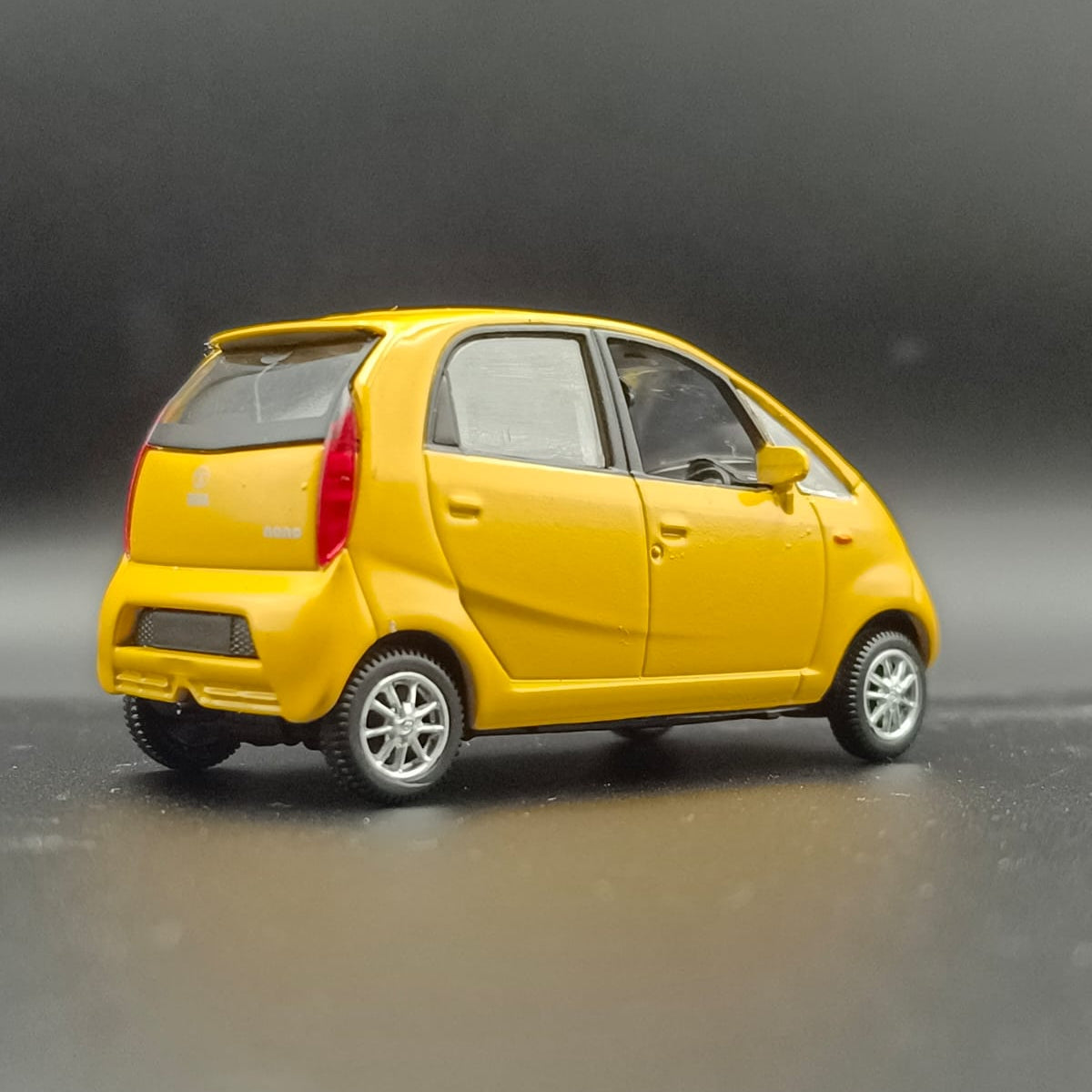 Tata Nano Miniature Scale Model Toy Car (Yellow) - Pull Back/Free Wheel Action