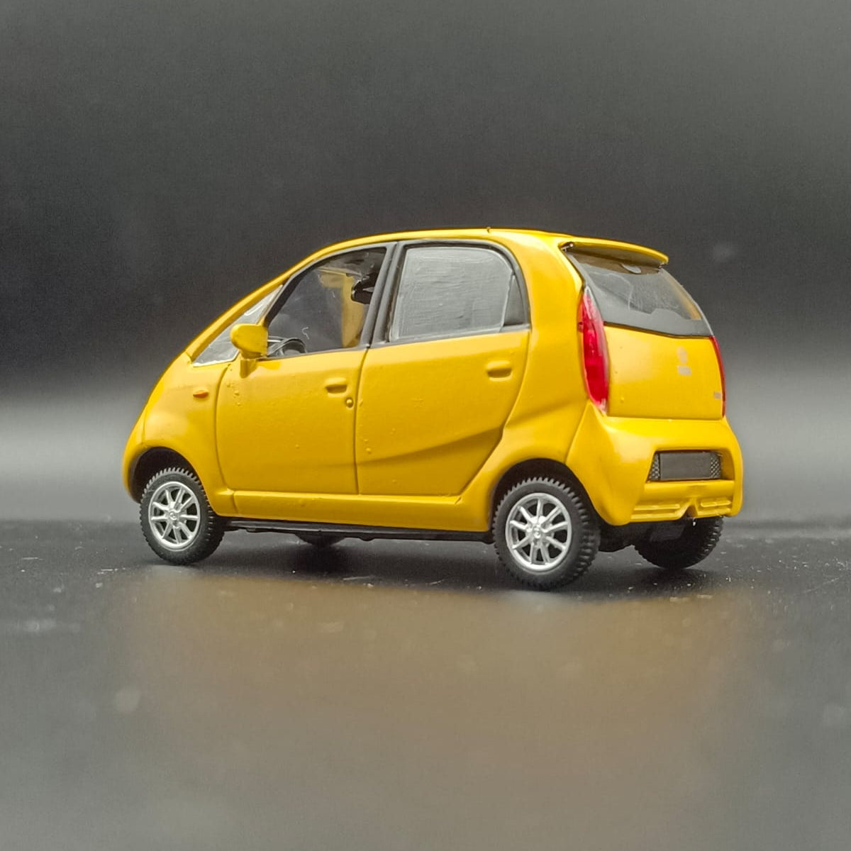 Tata Nano Miniature Scale Model Toy Car (Yellow) - Pull Back/Free Wheel Action