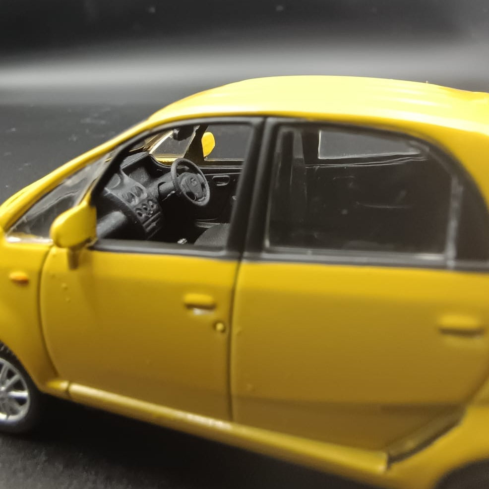 Tata Nano Miniature Scale Model Toy Car (Yellow) - Pull Back/Free Wheel Action