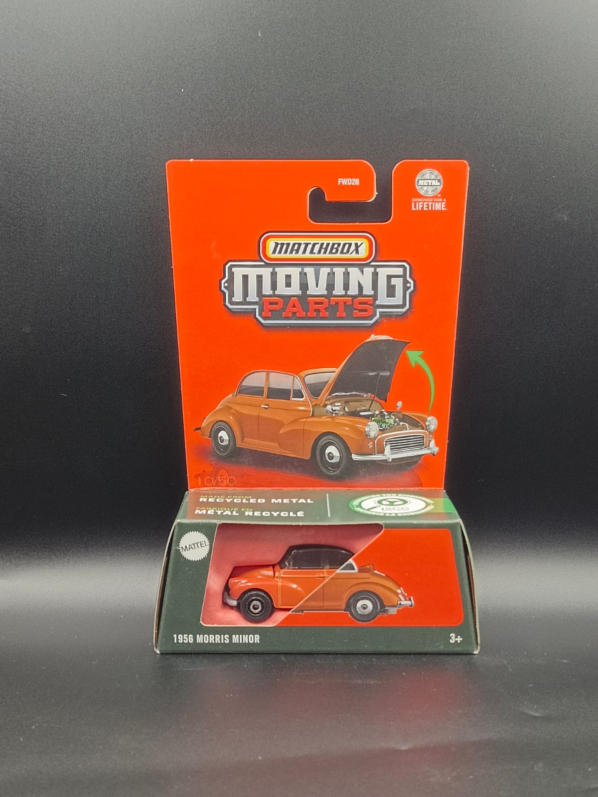 Matchbox Moving Parts - 1956 Morris Minor (Orange) 1:64 Scale Diecast Vehicle