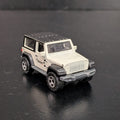 Matchbox Jurassic World Rebirth '18 Jeep Wrangler (Biosyn Genetics Livery) - 1:64 Scale Diecast